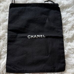 CHANEL Black Drawstring Pouch with White Logo